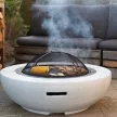 Kőhatású kerek tűzrakó és grillező