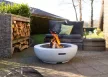 Kőhatású kerek tűzrakó és grillező